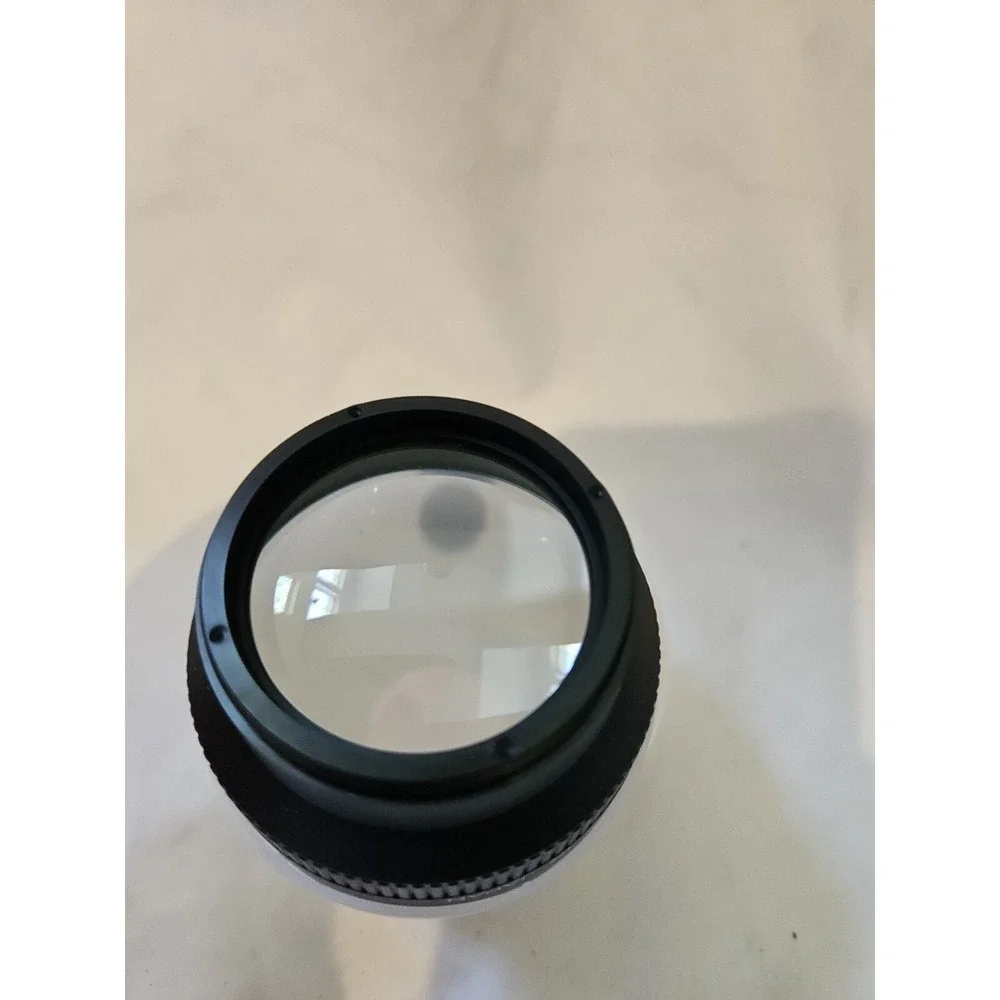 Wide angle lens made in Japan,‎ listed with Both Lens caps